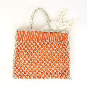 Pilwa fina con género color naranjo