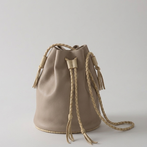 bolso ñocha y cuero